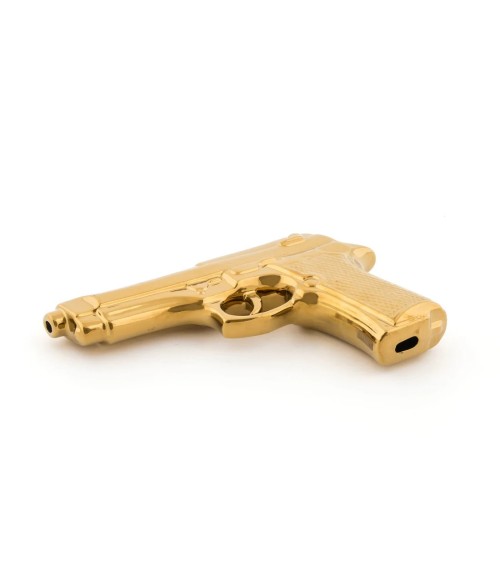 Objeto decorativo “Memorabilia Gold My Gun” – SELETTI